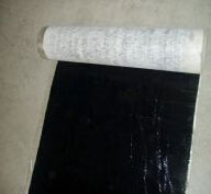 Self adhered polymer waterproofing materials